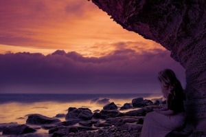 Woman thinking in sunset